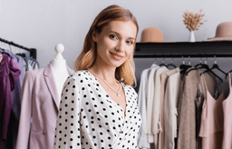 Woman smiling in a closet