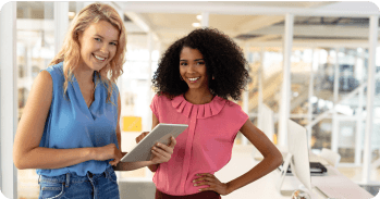 Two business women smiling